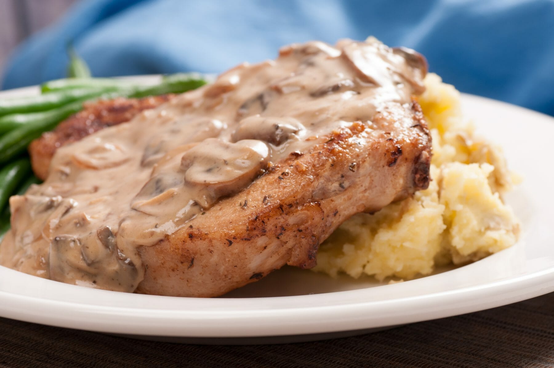 Mushroom Smothered Pork Chops - Tanya's Kitchen
